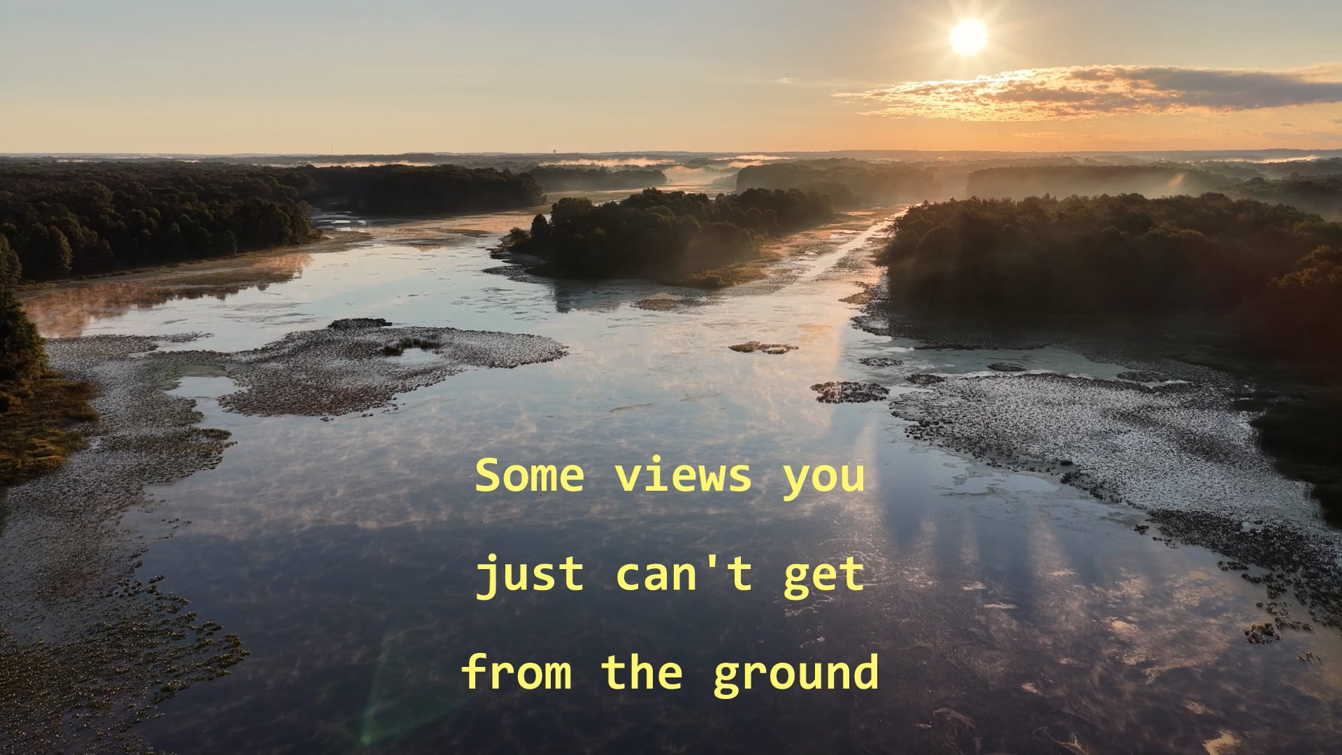 Still frame from the showreel: sunrise over a misty marsh